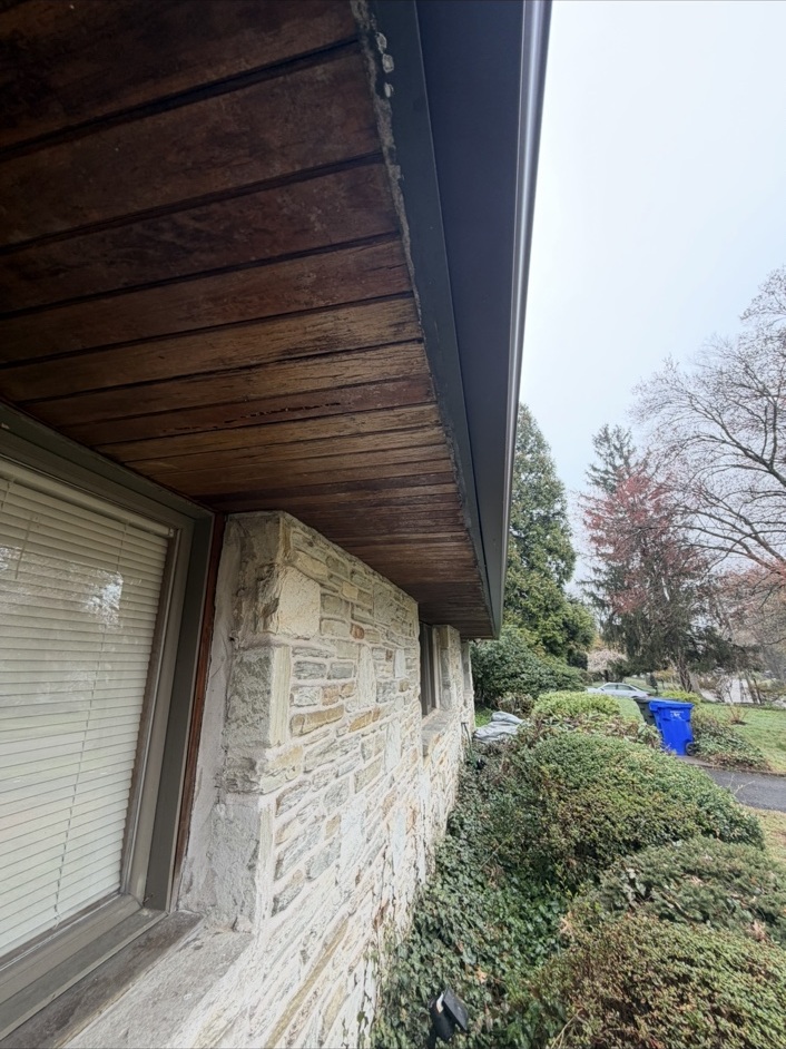 Exterior wood soffit before restoration